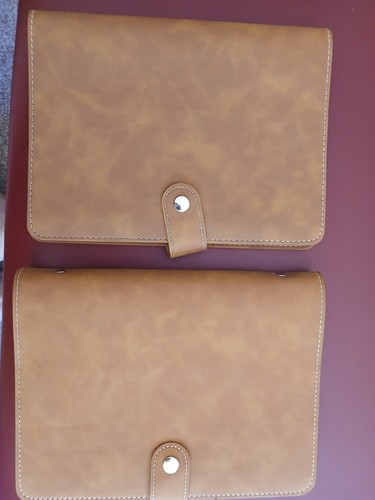 Two faux leather diary - two,
